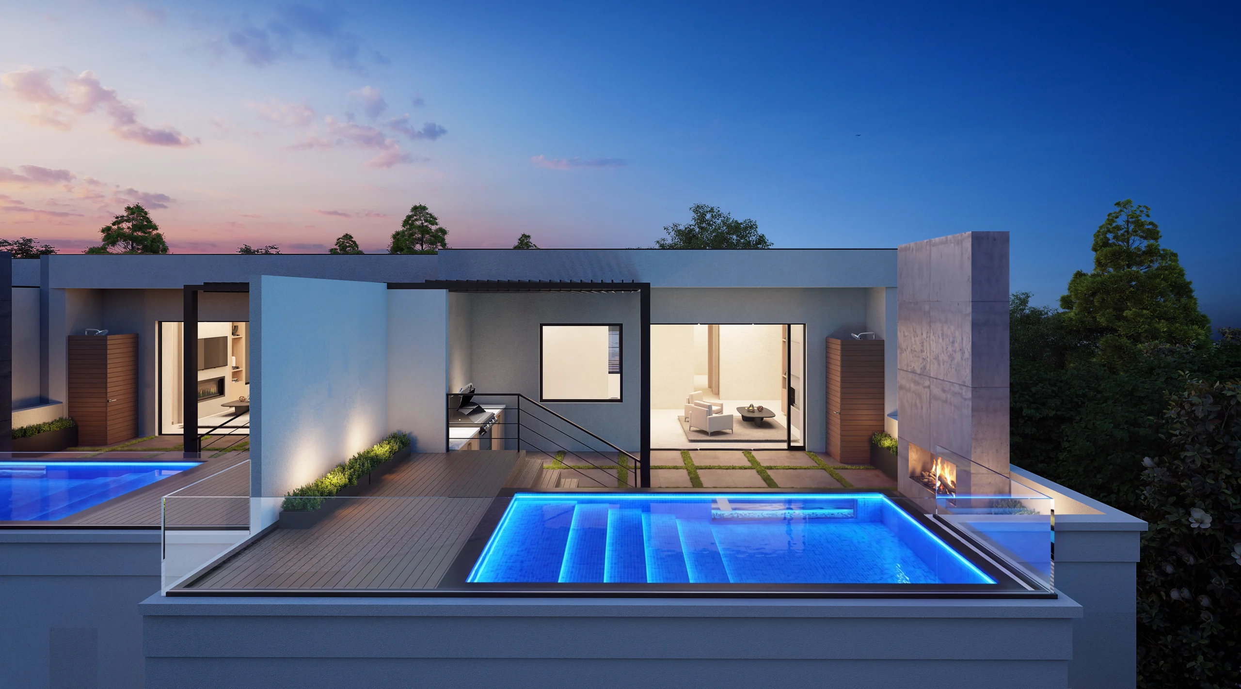 Modern rooftop pool and patio in Lake Norman townhomes at dusk, featuring illuminated pool, cozy fireplace, and scenic view.
